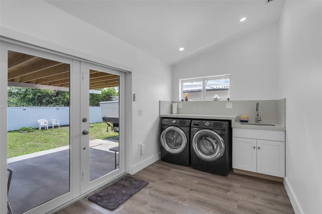 1814 NW 73rd St, Miami, FL 33147 - laundry area with washer and dryer, cabinet space, healthy amount of natural light, wood finished floors, and recessed lighting