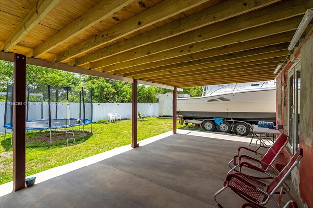 1814 NW 73rd St, Miami, FL 33147 - view of patio / terrace featuring a trampoline, a shed, and an outbuilding