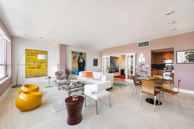 4925 Collins Ave Unit 8G, Miami Beach, FL 33140 - living area with baseboards and visible vents
