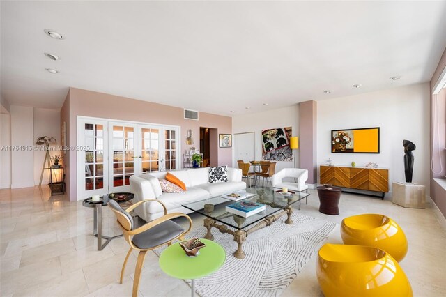 4925 Collins Ave Unit 8G, Miami Beach, FL 33140 - living room with visible vents, french doors, plenty of natural light, and recessed lighting