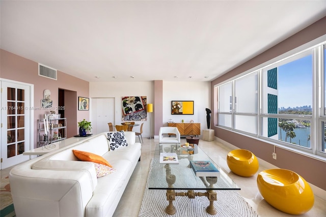 4925 Collins Ave Unit 8G, Miami Beach, FL 33140 - living room featuring visible vents
