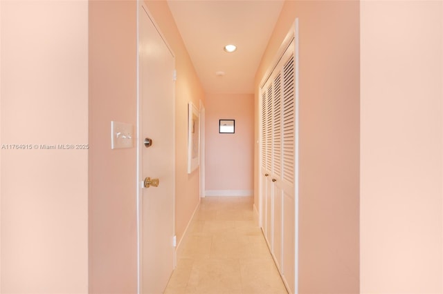 4925 Collins Ave Unit 8G, Miami Beach, FL 33140 - hallway with baseboards, recessed lighting, and light tile patterned floors