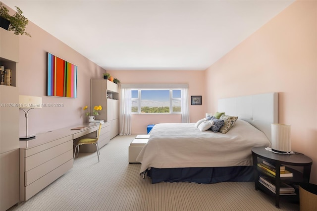4925 Collins Ave Unit 8G, Miami Beach, FL 33140 - bedroom with freestanding refrigerator and light carpet