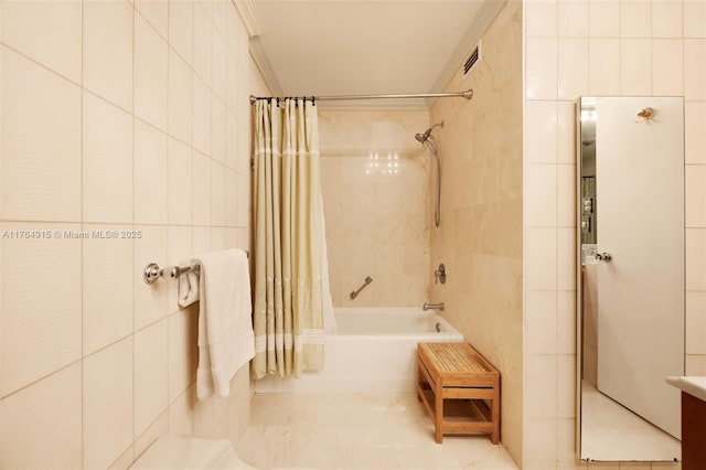 4925 Collins Ave Unit 8G, Miami Beach, FL 33140 - bathroom with shower / bath combo, tile walls, visible vents, tile patterned flooring, and crown molding