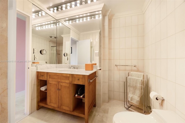 4925 Collins Ave Unit 8G, Miami Beach, FL 33140 - full bathroom featuring crown molding, vanity, tile walls, toilet, and tile patterned flooring