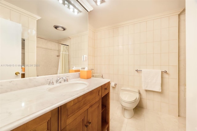 4925 Collins Ave Unit 8G, Miami Beach, FL 33140 - bathroom featuring tile patterned floors, toilet, vanity, ornamental molding, and tile walls