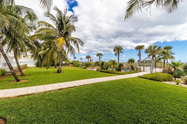 4925 Collins Ave Unit 8G, Miami Beach, FL 33140 - view of property's community with fence, a gate, and a yard