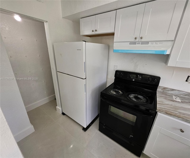 450 NW 84th St Unit 450, Miami, FL 33150 - kitchen featuring under cabinet range hood, black electric range oven, freestanding refrigerator, white cabinets, and light countertops