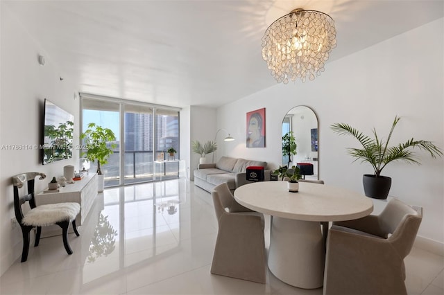 dining space with expansive windows, a chandelier, and light tile patterned floors