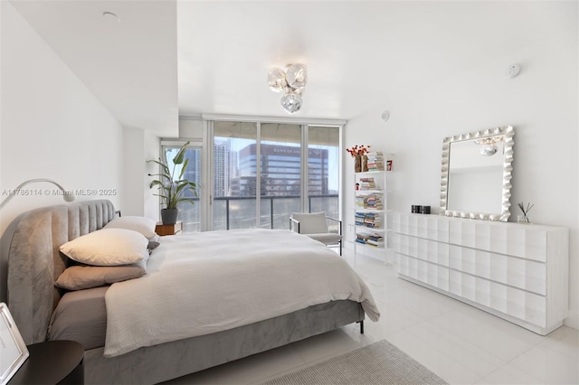 tiled bedroom featuring floor to ceiling windows