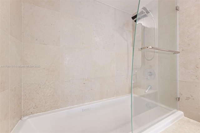 bathroom featuring an enclosed shower