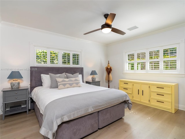 5510 San Vicente St, Coral Gables, FL 33146 - bedroom with visible vents, light wood-style floors, ornamental molding, and multiple windows