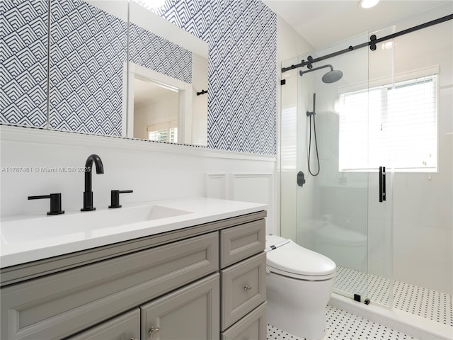 5510 San Vicente St, Coral Gables, FL 33146 - full bath with plenty of natural light, a stall shower, vanity, a wainscoted wall, and toilet