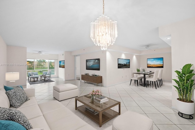 12547 Imperial Isle Dr Unit 204, Boynton Beach, FL 33437 - living area featuring light tile patterned flooring and ceiling fan with notable chandelier