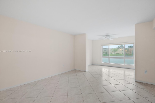 12547 Imperial Isle Dr Unit 204, Boynton Beach, FL 33437 - spare room with ceiling fan and light tile patterned flooring