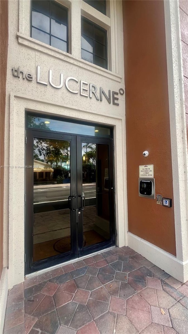 511 Lucerne Ave Unit 408, Lake Worth, FL 33460 - doorway to property featuring french doors