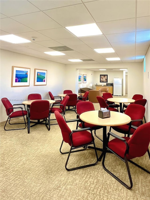 511 Lucerne Ave Unit 408, Lake Worth, FL 33460 - dining area with a paneled ceiling and carpet floors