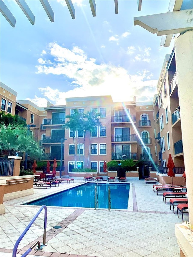 511 Lucerne Ave Unit 408, Lake Worth, FL 33460 - community pool with a patio area