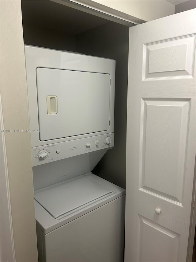 511 Lucerne Ave Unit 408, Lake Worth, FL 33460 - laundry area with estacked washer and dryer