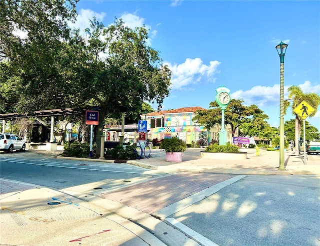 511 Lucerne Ave Unit 408, Lake Worth, FL 33460 - view of asphalt street with street lights, curbs, traffic signs, and sidewalks