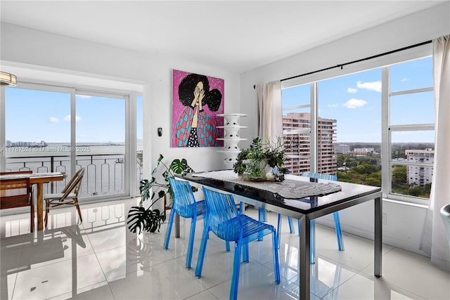 11111 Biscayne Blvd Unit 19G, Miami, FL 33181 - dining space featuring a view of city and tile patterned flooring