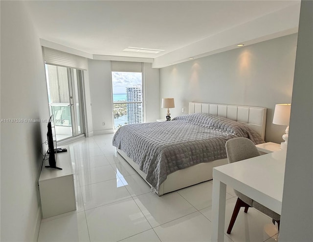 21055 Yacht Club Dr Unit 3101, Aventura, FL 33180 - bedroom featuring light tile patterned floors, access to outside, and baseboards