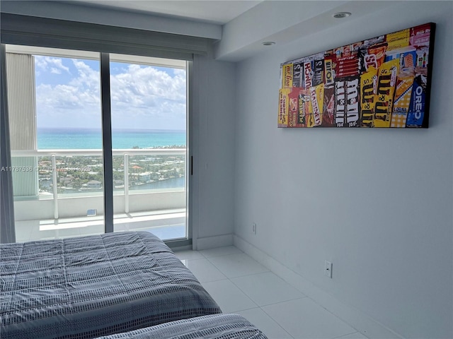 21055 Yacht Club Dr Unit 3101, Aventura, FL 33180 - tiled bedroom featuring a water view and baseboards