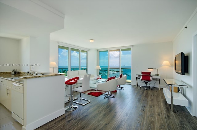 2889 Mcfarlane Rd Unit 1601, Coconut Grove, FL 33133 - living room featuring wood finished floors and baseboards