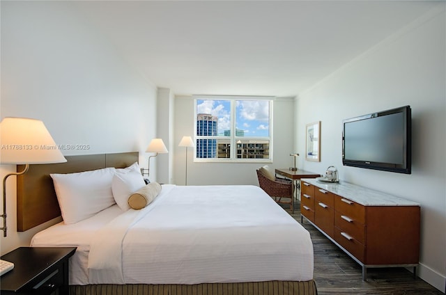 2889 Mcfarlane Rd Unit 1601, Coconut Grove, FL 33133 - bedroom featuring crown molding, dark wood-style floors, and baseboards