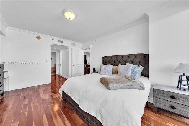 1830 S Ocean Dr Unit Lph4910, Hallandale Beach, FL 33009 - bedroom featuring ornamental molding, wood finished floors, and baseboards