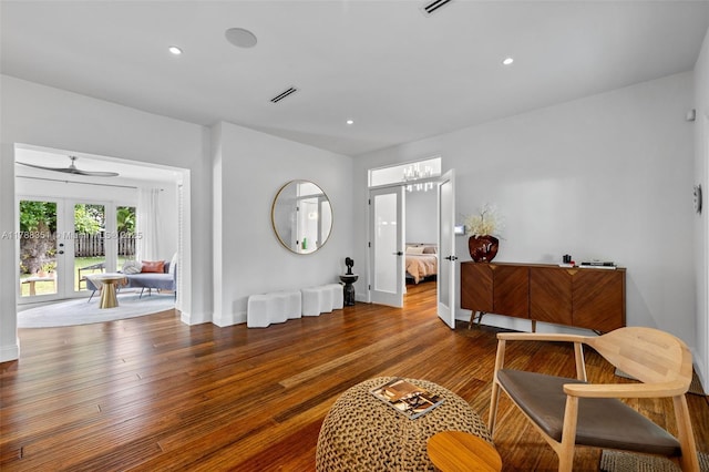 55 NE 87th St, El Portal, FL 33138 - living area with french doors, recessed lighting, baseboards, wood finished floors, and visible vents