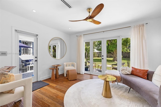 55 NE 87th St, El Portal, FL 33138 - sitting room with wood finished floors, baseboards, recessed lighting, french doors, and a ceiling fan