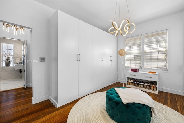 55 NE 87th St, El Portal, FL 33138 - bedroom featuring baseboards, a chandelier, and multiple windows