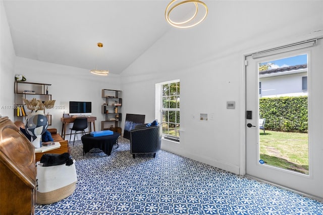 55 NE 87th St, El Portal, FL 33138 - living area featuring baseboards and lofted ceiling