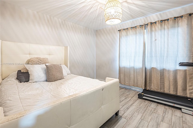 bedroom featuring light wood finished floors