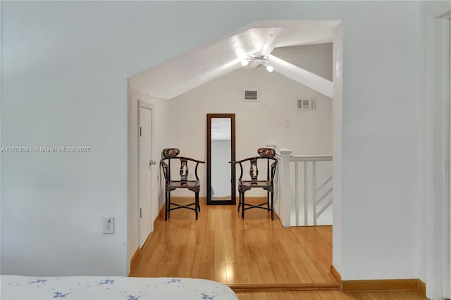 3375 SW 29th Ter, Miami, FL 33133 - bedroom with light wood-type flooring and lofted ceiling