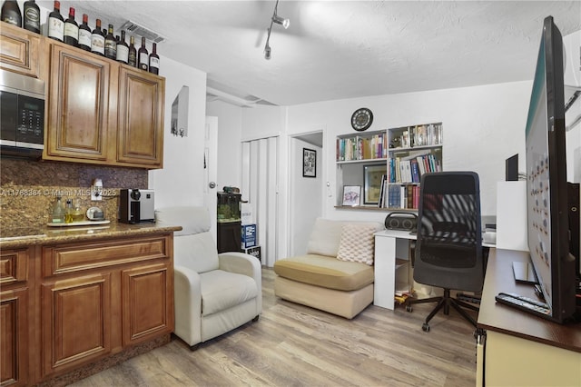 3375 SW 29th Ter, Miami, FL 33133 - home office with light wood finished floors and track lighting