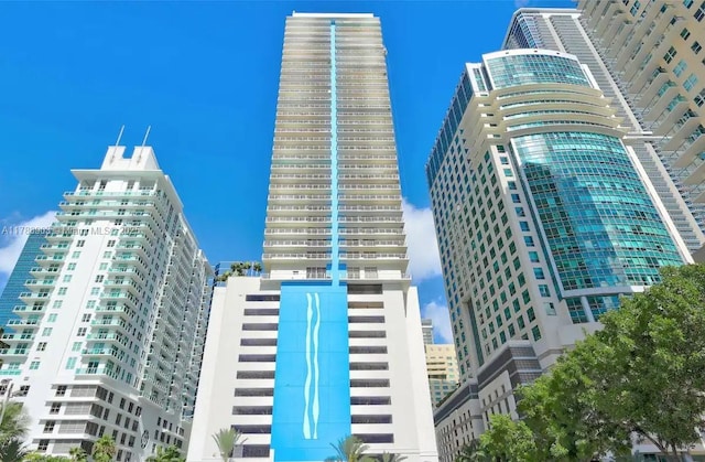 1200 Brickell Bay Dr Unit 1404, Miami, FL 33131 - view of building exterior with a city view