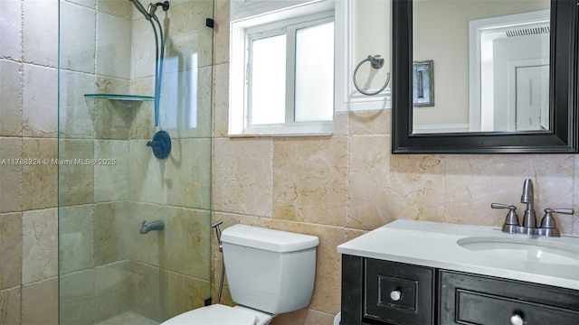 2105 Arch Creek Dr, North Miami, FL 33181 - full bath featuring tile walls, tiled shower, toilet, and vanity