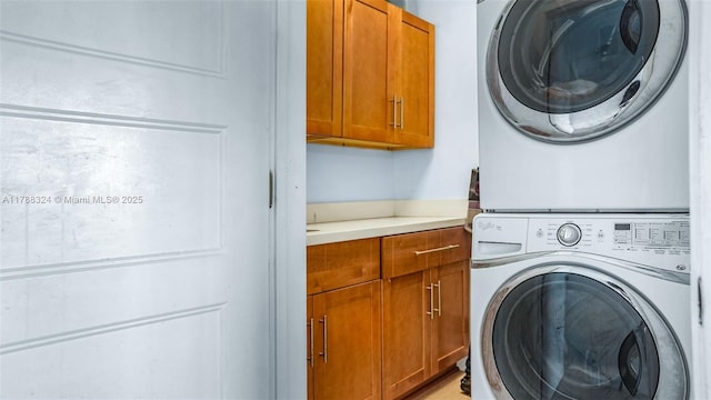 2105 Arch Creek Dr, North Miami, FL 33181 - laundry room with cabinet space and estacked washer and dryer
