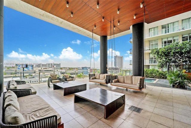 3451 NE 1st Ave Unit M0808, Miami, FL 33137 - view of patio / terrace with an outdoor living space and a city view