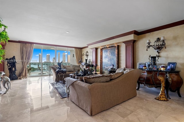 3201 NE 183rd St Unit 1107, Aventura, FL 33160 - living room featuring ornate columns, a wall of windows, and ornamental molding