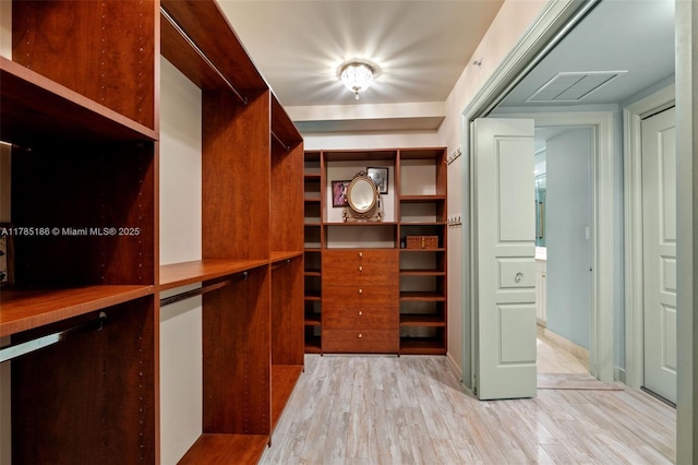 3201 NE 183rd St Unit 1107, Aventura, FL 33160 - walk in closet with light wood-style floors and visible vents