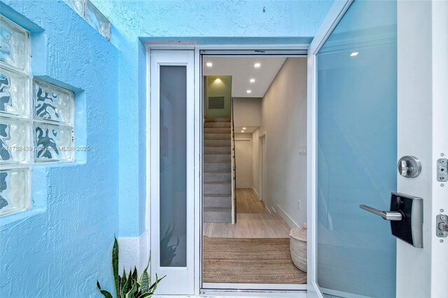 381 Franklin St, Hollywood, FL 33019 - doorway to property featuring stucco siding