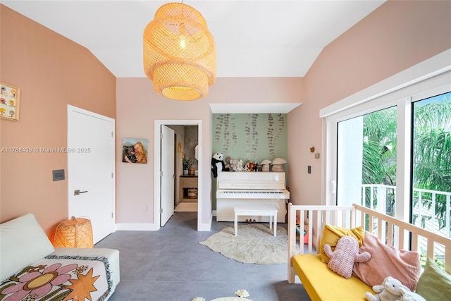 381 Franklin St, Hollywood, FL 33019 - interior space featuring vaulted ceiling, finished concrete floors, and baseboards