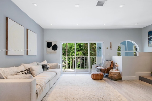 381 Franklin St, Hollywood, FL 33019 - living room featuring recessed lighting, wood finished floors, visible vents, and a wealth of natural light