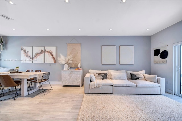 381 Franklin St, Hollywood, FL 33019 - living area with recessed lighting, visible vents, and light wood-type flooring