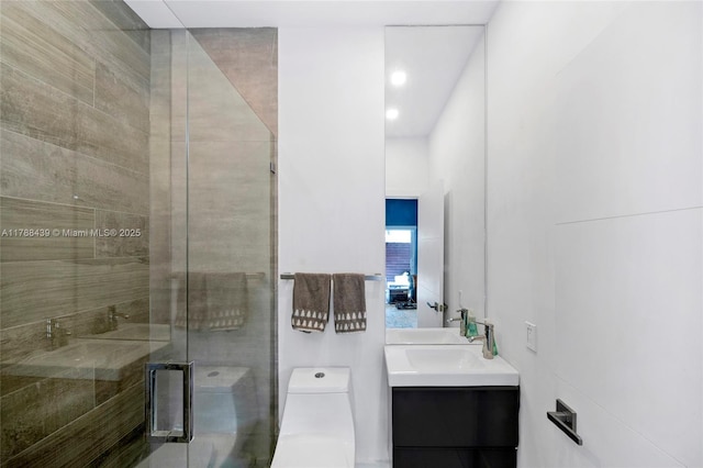 381 Franklin St, Hollywood, FL 33019 - full bath featuring vanity, recessed lighting, a shower stall, and toilet