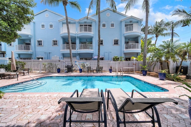 381 Franklin St, Hollywood, FL 33019 - community pool with a patio and fence