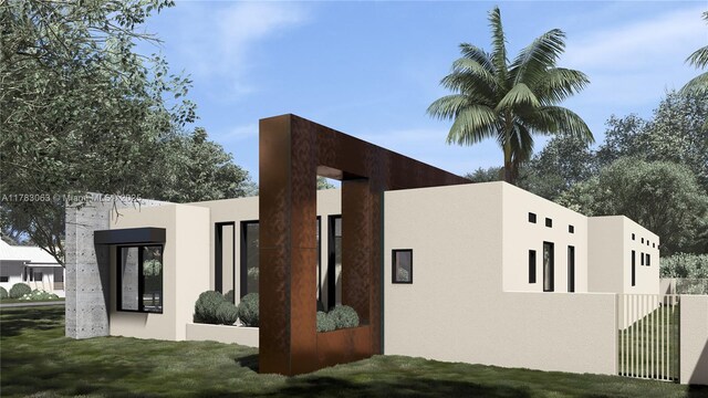 790 NE 96th St, Miami Shores, FL 33138 - view of home's exterior featuring stucco siding and fence